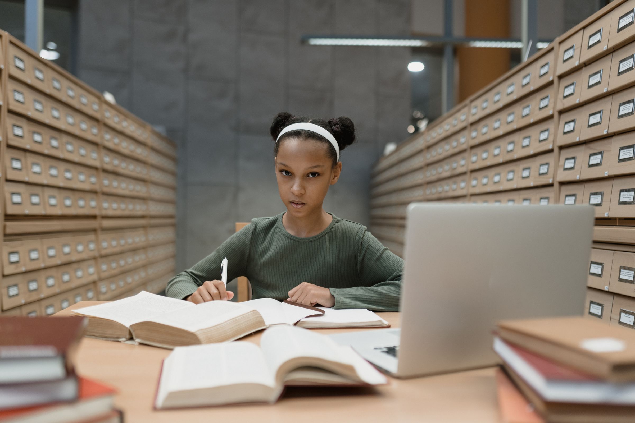 A student browsing a library catalogue